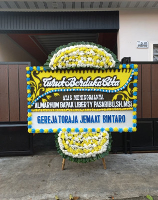 Papan Bunga Duka di Sungai Harapan