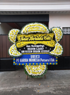 Papan Bunga Duka di Sungai Harapan